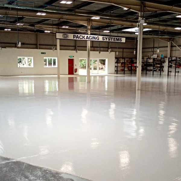 White epoxy resin floor in a warehouse