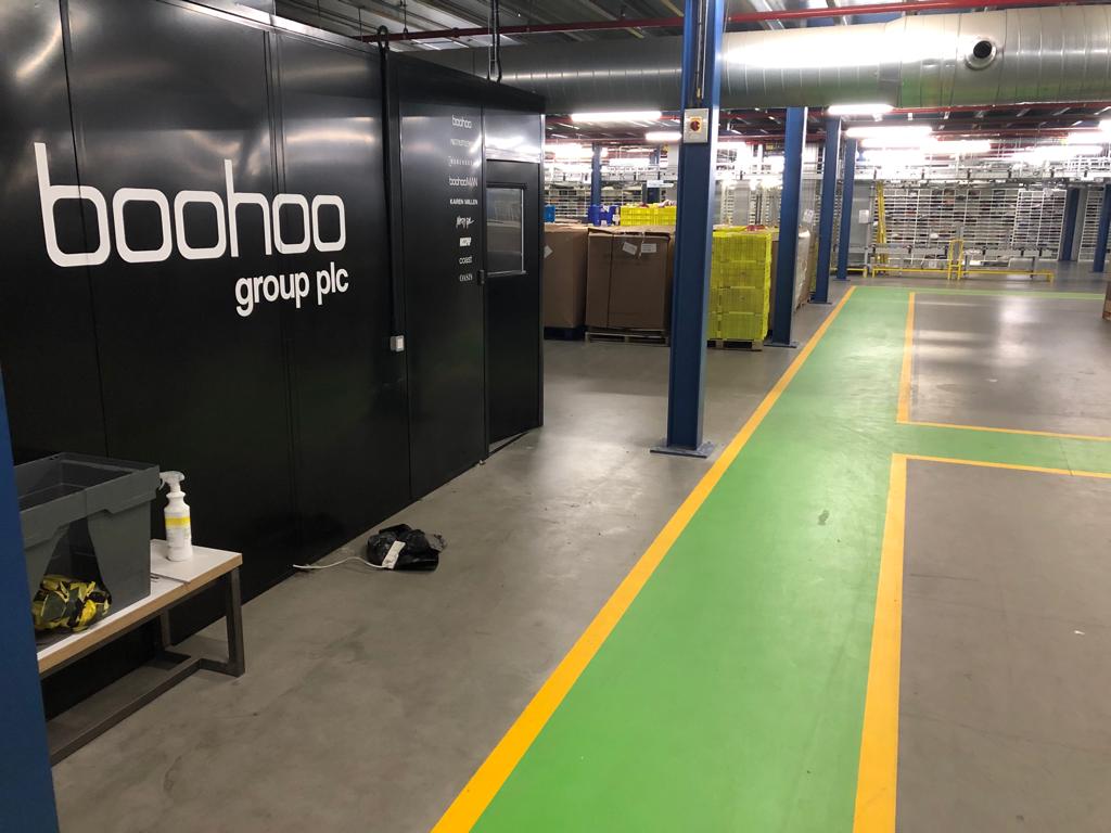 Boohoo warehouse flooring after the application of line markings